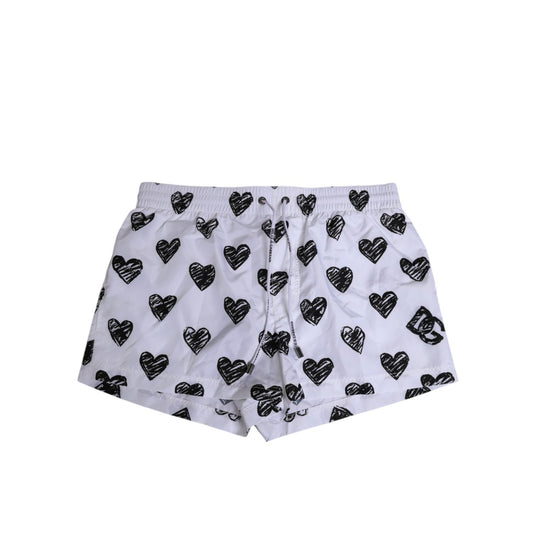 Dolce & Gabbana White Black Heart Print Men Boxer Short Swimwear with elastic waistband and drawstring closure.
