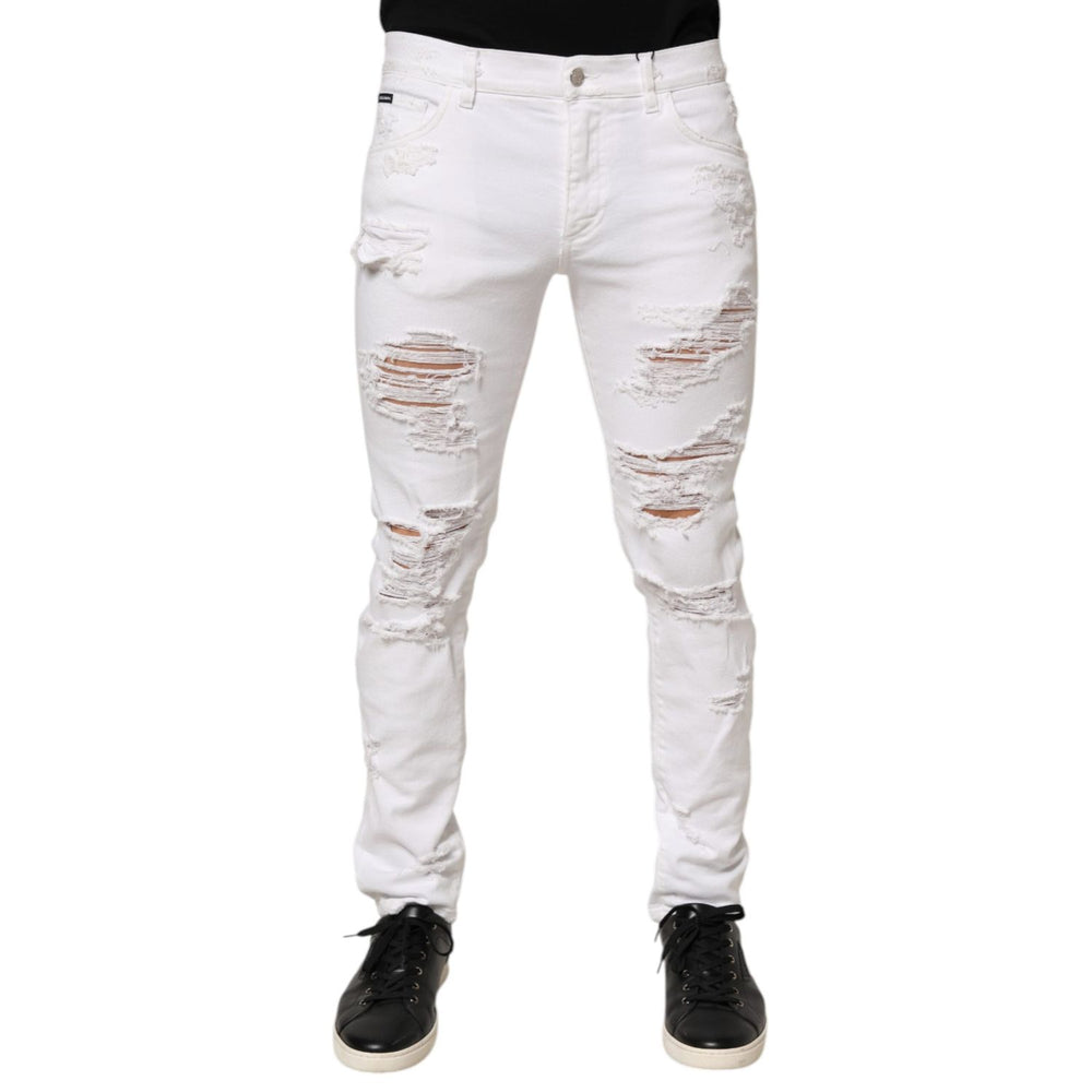 Dolce & Gabbana White Distressed Ripped Denim Trouser Jeans showcasing a modern, edgy look with ripped detailing and luxury craftsmanship.
