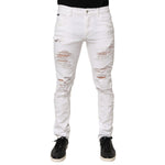 Dolce & Gabbana White Distressed Ripped Denim Trouser Jeans with ripped detailing and modern fit, perfect for a casual edgy look.