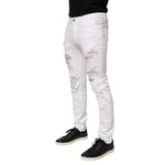 Dolce & Gabbana White Distressed Ripped Denim Trouser Jeans with ripped detailing and modern fit.