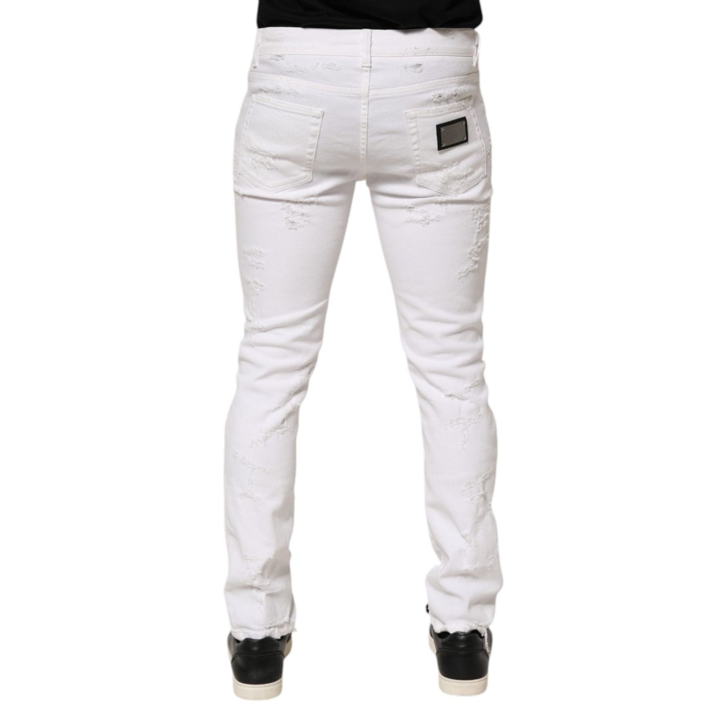 Dolce & Gabbana White Distressed Ripped Denim Trouser Jeans showing back view with distressed detailing and premium craftsmanship.