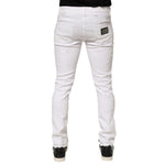 Dolce & Gabbana White Distressed Ripped Denim Trouser Jeans showing back view with distressed detailing and premium craftsmanship.