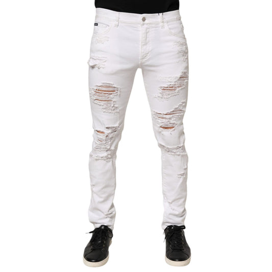 Dolce & Gabbana White Distressed Ripped Denim Trouser Jeans showcasing a modern, edgy look with ripped detailing and luxury craftsmanship.