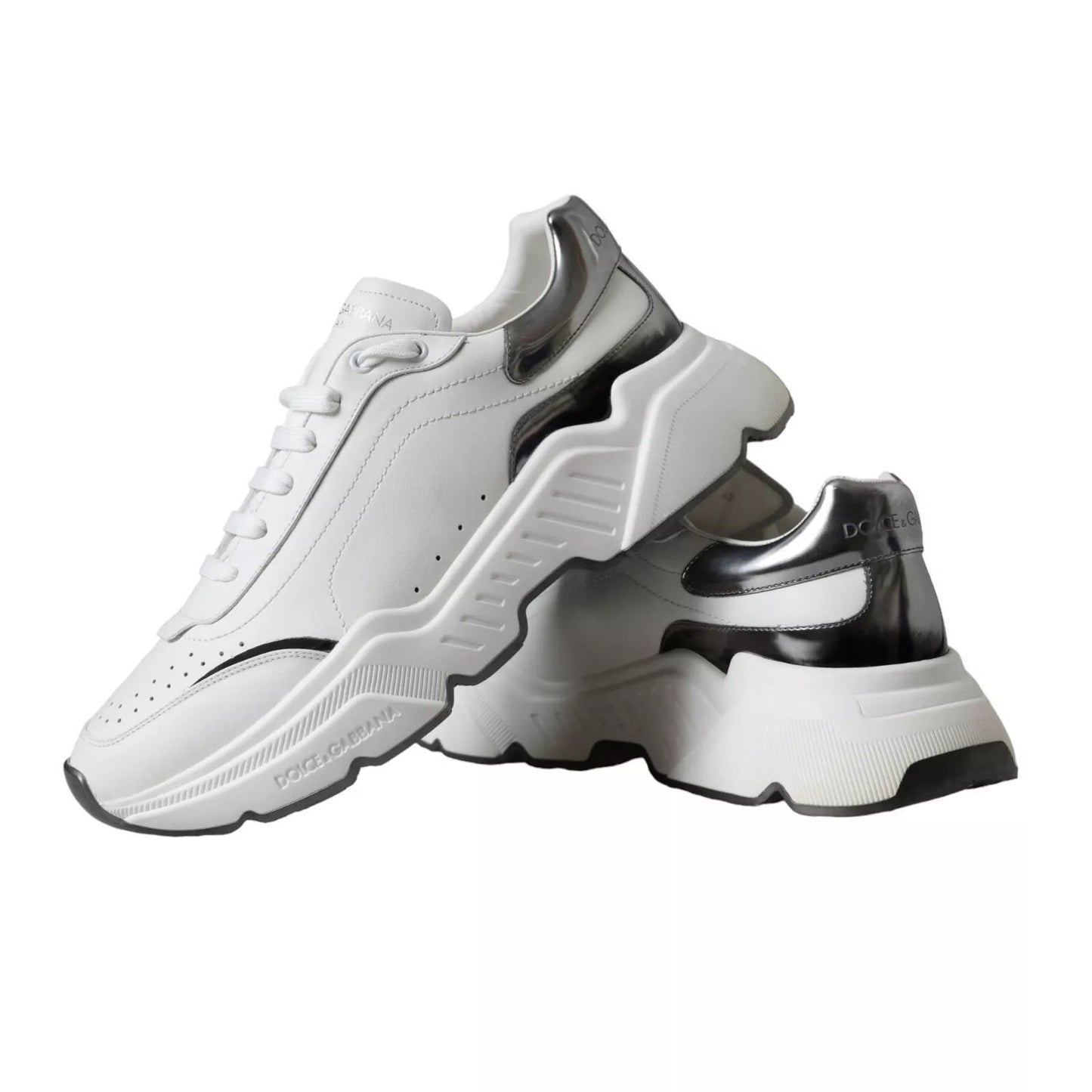 Dolce & Gabbana White Silver Leather Sport DAYMASTER Sneakers with rubber sole and logo details, showcasing minor heel miscoloration.