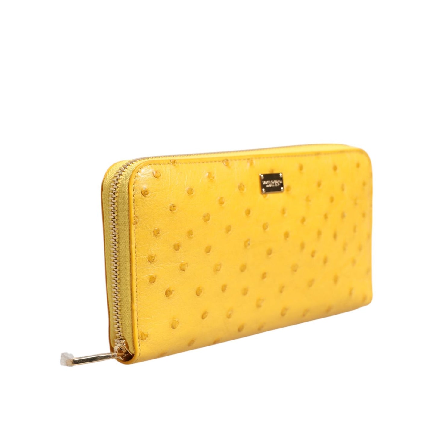 Dolce & Gabbana Yellow Leather Logo Plaque Zip Around Continental Wallet with metal hardware and zipper, showcasing elegant design.
