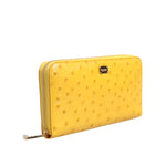 Dolce & Gabbana Yellow Leather Logo Plaque Zip Around Continental Wallet with metal hardware and zipper, showcasing elegant design.