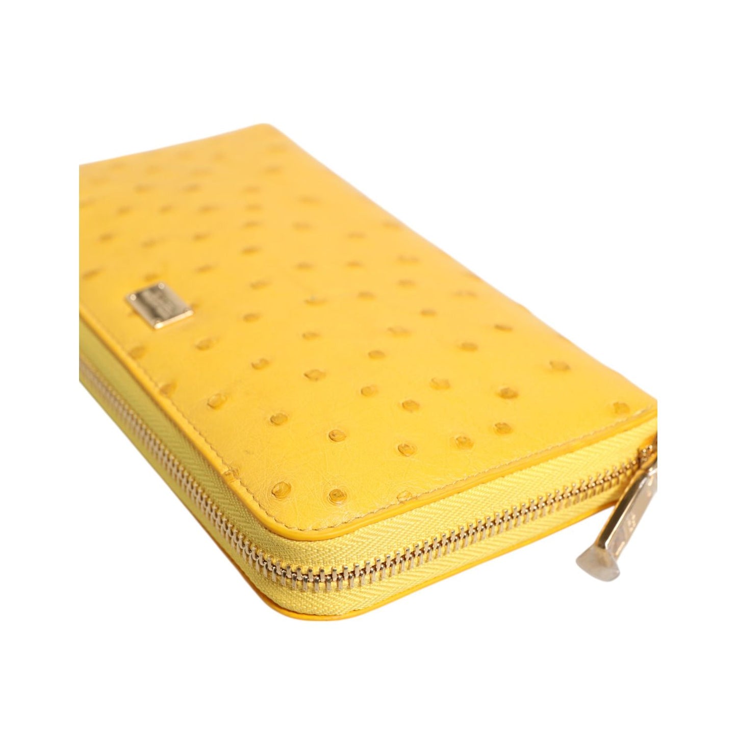 Dolce & Gabbana Yellow Leather Logo Plaque Zip Around Continental Wallet with zipper fastening and logo engraved metal hardware in yellow.