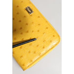 Dolce & Gabbana Yellow Leather Logo Plaque Zip Around Continental Wallet showing minor scratch on front