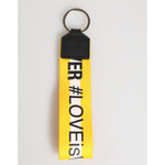 Dolce & Gabbana Yellow Logo Polyester Silver Brass Holder Keychain Keyring with logo printed strap and sleek hardware.