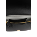 Interior view of Emporio Armani Crossbody mini bag with black logo-print strap, gold-tone hardware, and magnetic fastening.