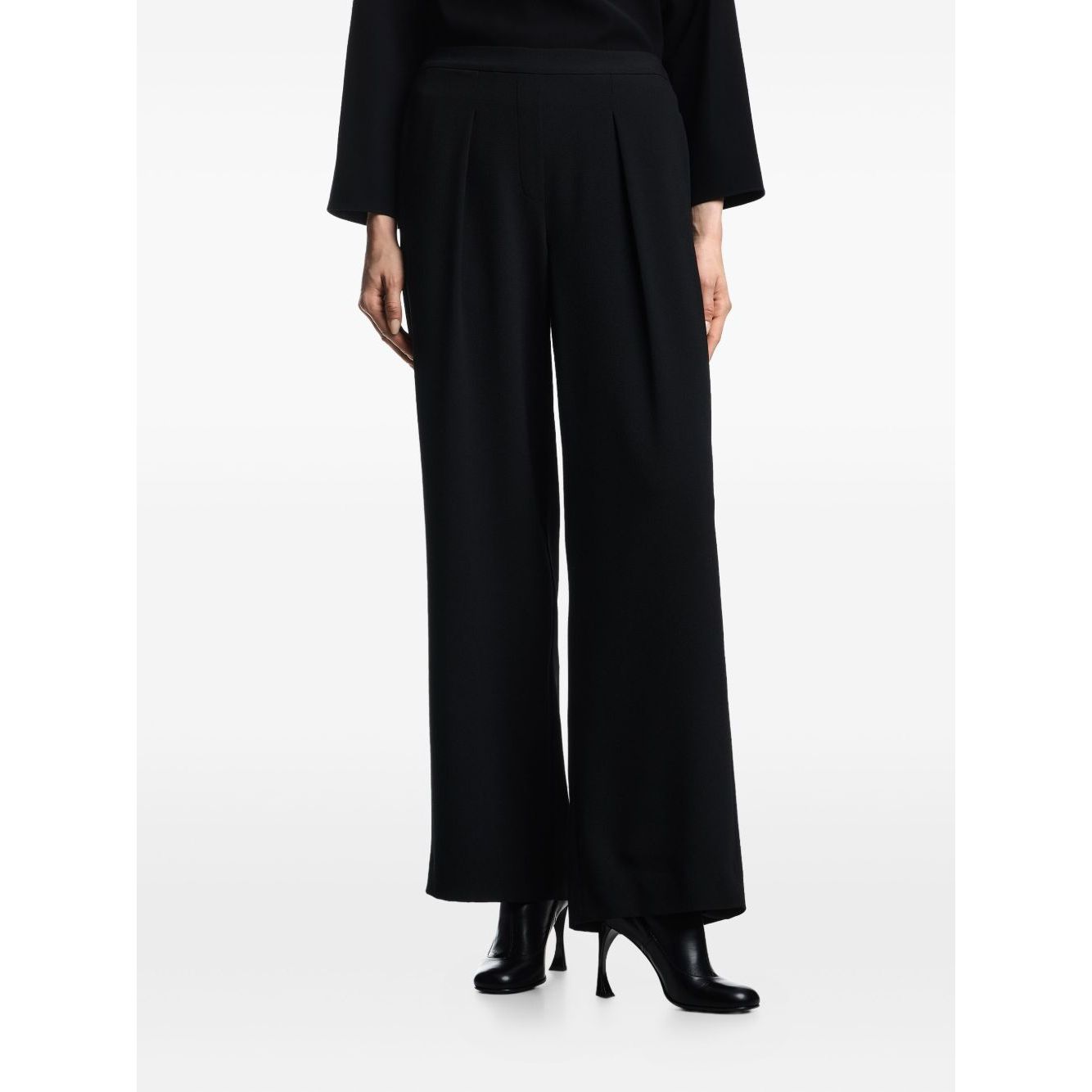 Emporio Armani Trousers Black with pleated detailing, high waist, straight hem, side pockets, and straight-leg style.