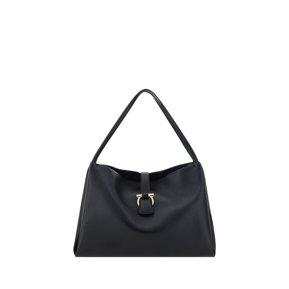 Front view with bag zipped and handles upright.