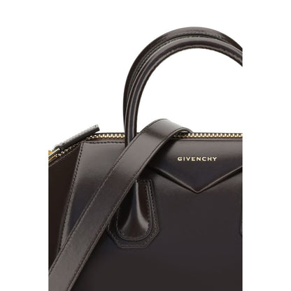 Close-up of Givenchy Brown Calf Leather Bos Taurus Handbag with logo and strap details.