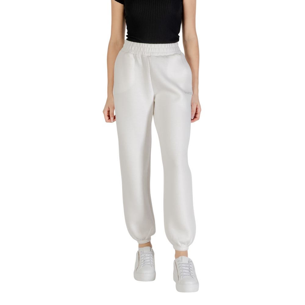 Woman wearing Guess Active Cream Viscose Joggers (Workout Pants), showcasing style and comfort fit for casual and sporty use.