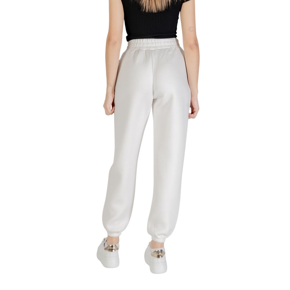 Guess Active Cream Viscose Joggers (Workout Pants) with elastic waistband and casual fit, back view on model.