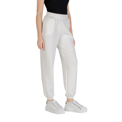 Woman wearing Guess Active Cream Viscose Joggers (Workout Pants) showing style and comfort with elastic waistband and soft feel