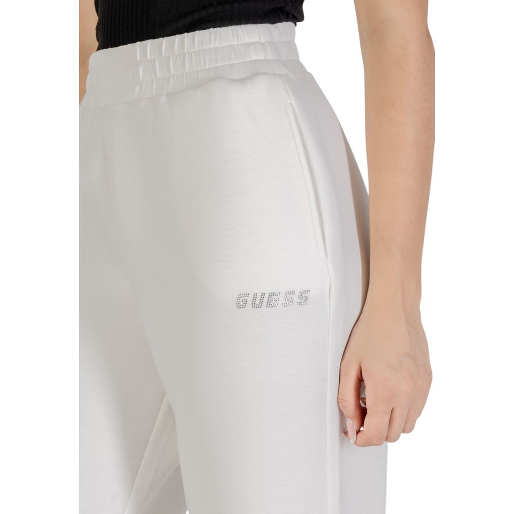 Woman wearing Guess Active Cream Viscose Joggers (Workout Pants) with elastic waistband for comfort and style