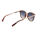 Guess Brown Unisex Sunglass with round full-rim stainless steel frame, brown color. Gradient blue plastic lenses width 53, 100% UVA & UVB protection.