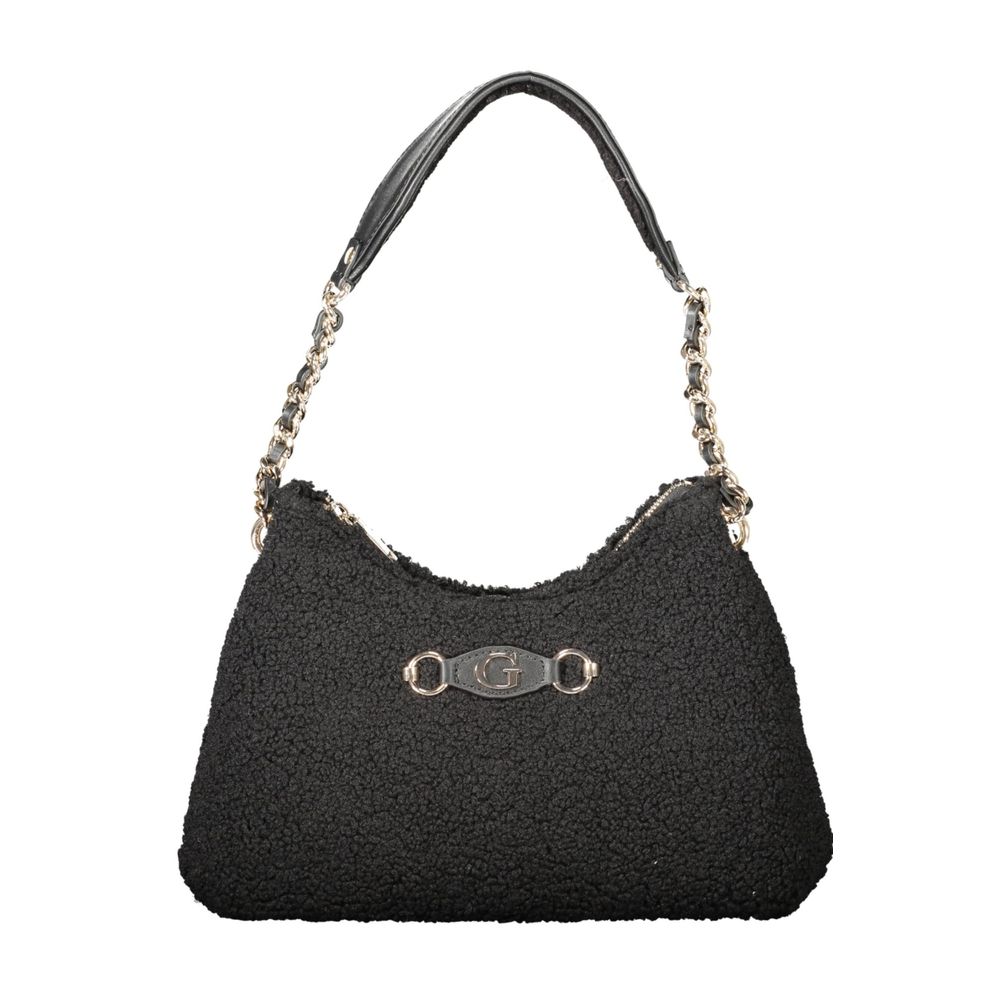Front view with bag zipped and handles upright.