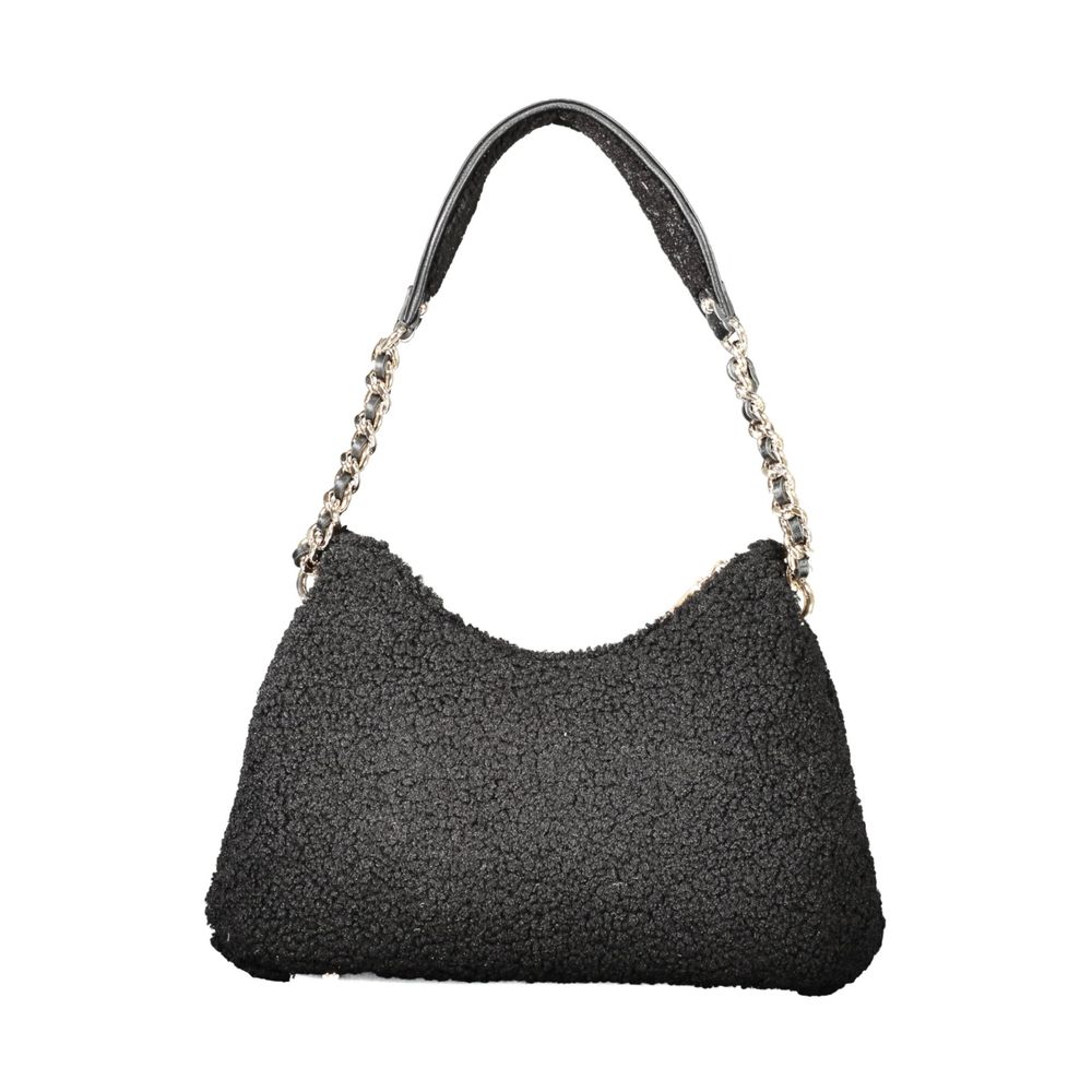 Front view with bag zipped and handles upright.