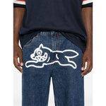 ICECREAM Jeans Blue featuring Running Dog graphic, indigo denim, belt loops, logo patch, straight leg, and classic five-pocket design.