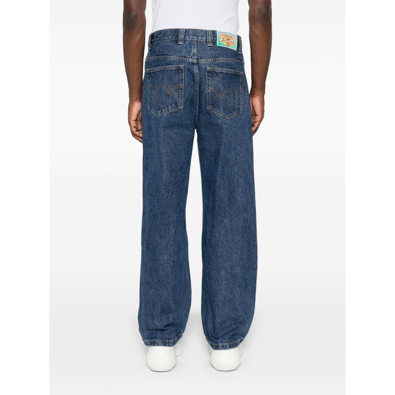 Back view of ICECREAM Jeans Blue featuring indigo denim, rear logo patch, and classic straight leg.