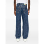 Back view of ICECREAM Jeans Blue featuring indigo denim, rear logo patch, and classic straight leg.