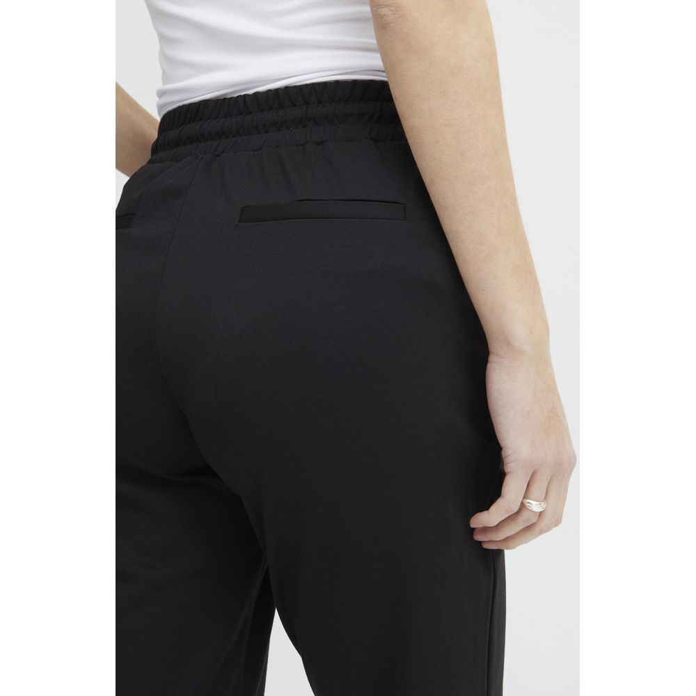 Back view of ICHI Black Polyester Pant with elastic waistband and slim fit.
