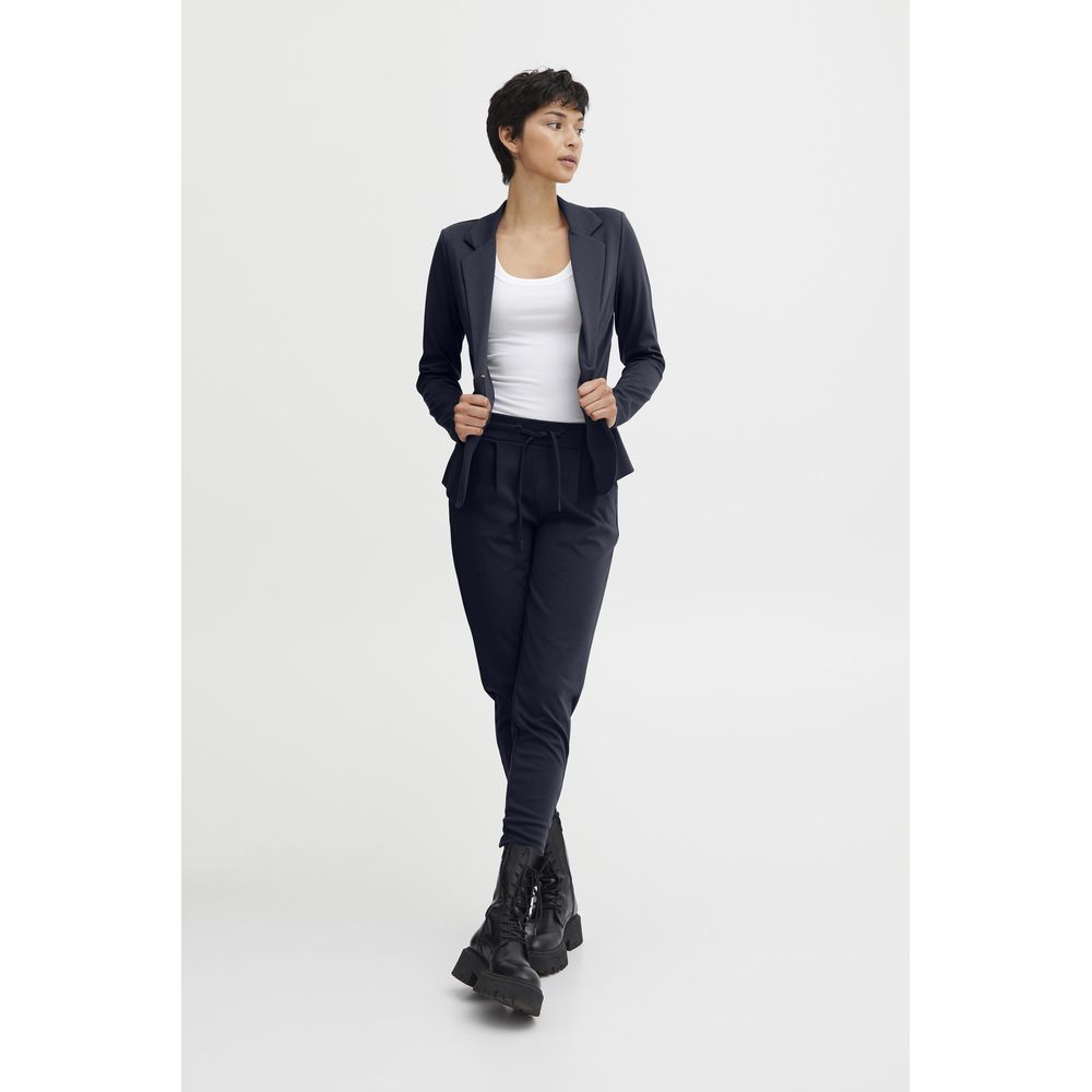Model wearing ICHI Blue Polyester Pant, showcasing modern style with elastic waistband and front pleats.