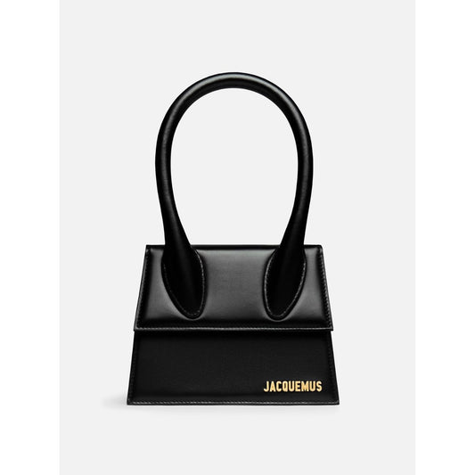 Jacquemus Le Chiquito Moyen Black Bag with gold hardware and logo, featuring reinforced handle and magnetic flap closure, shown on white background.