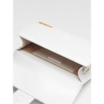 Jacquemus Le Grand Bambino White Bag interior view with card pocket, leather material, and gold logo detail.