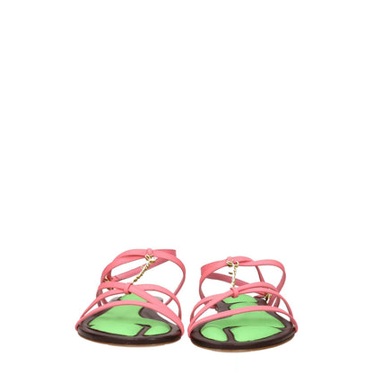 Jacquemus Pink Leather Flat Sandals with buckle closure, featuring an open toe and gold front logo. Casual style, low flat heel.