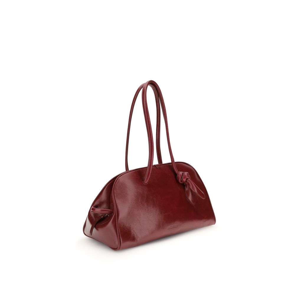 Jacquemus Red Calf Leather Bos Taurus Shoulder Bag with double-zip closure and tubular handles, featuring a vintage glossy finish.