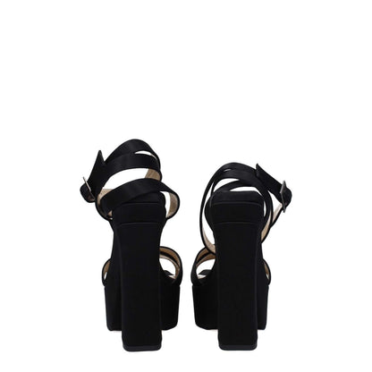 Back view of Jimmy Choo Black Satin Platform Sandals with buckle closure and high heels.