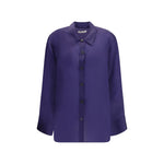 Khaite Semi-sheer Herschel Top in purple with front button closure, classic collar, and asymmetrical hem, designed for a modern flowing look.