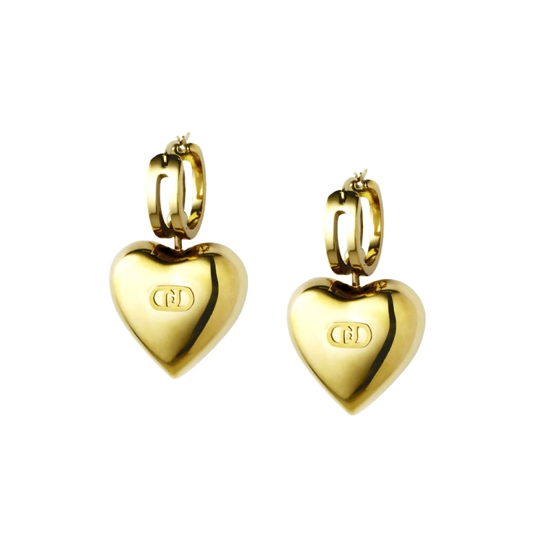 Gold heart-shaped hoop earrings with engraved initials, showcasing elegance and style for a sophisticated look.