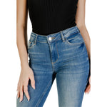 Model wears Liu Jo Blue Cotton Bootcut Jean showcasing high waist and flared design.