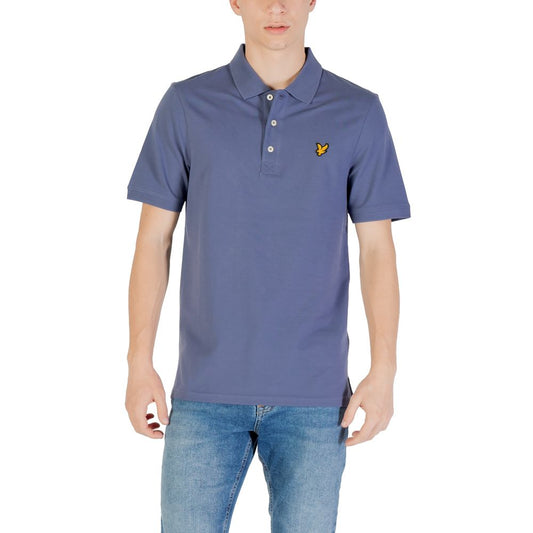 Man wearing a Lyle & Scott Blue Cotton Polo Shirt, featuring the brand's logo, paired with jeans for a casual look.