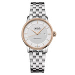 MIDO MOD. BARONCELLI watch with silver and rose gold accents, featuring a date display on a stainless steel bracelet.