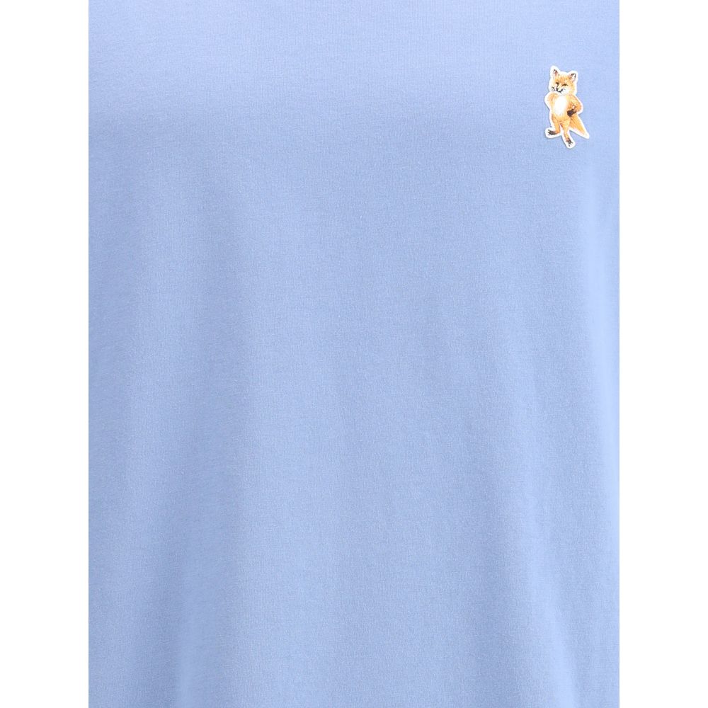 Maison Kitsuné Light Blue Cotton T-Shirt with embroidered Standing Fox patch on chest, featuring short sleeves and ribbed crew neck.