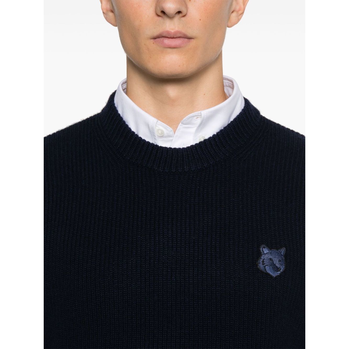 Maison Kitsuné MAISON KITSUNE' Sweaters Blue featuring oxford blue fisherman's knit, logo patch, and ribbed crew neck design.