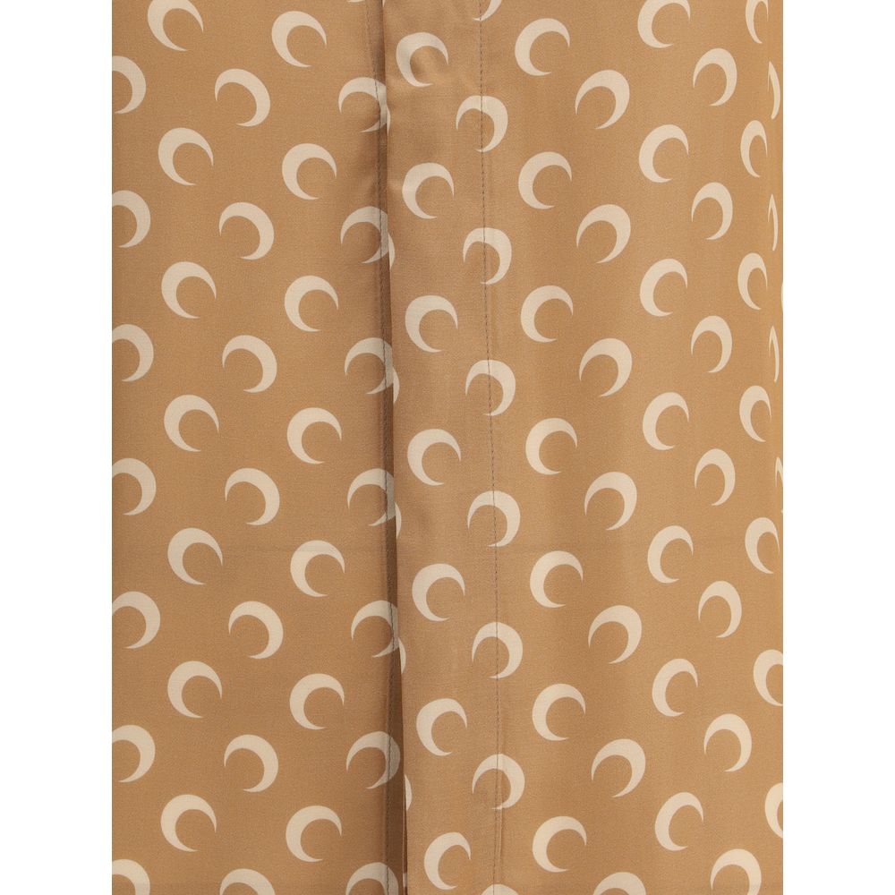 Close-up of Marine Serre Satin Moon Shirt fabric with iconic moon pattern.