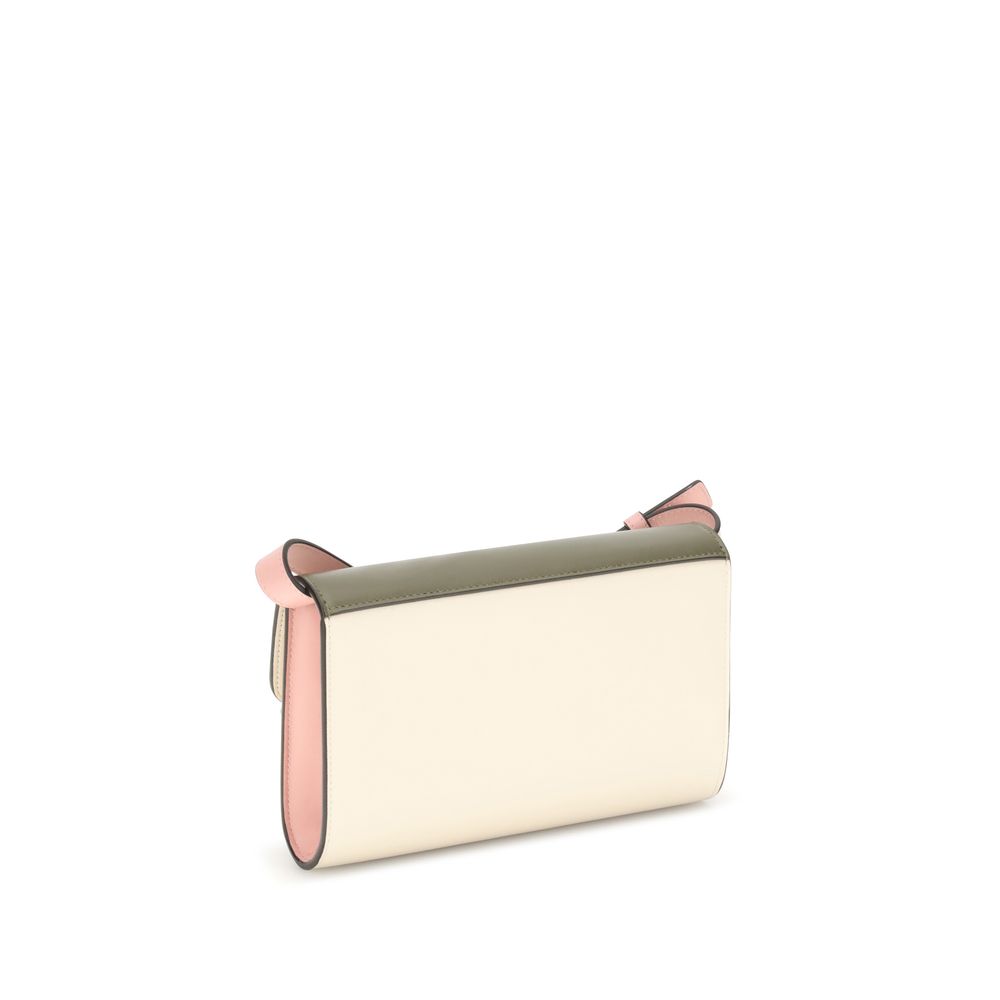 Front view with bag zipped and handles upright.