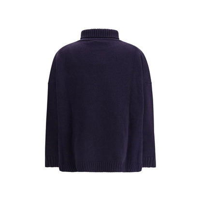 Back view of Max Mara Blue Fleece Wool Turtleneck with oversized fit and ribbed edges for a sophisticated winter look.