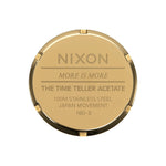 Back view of NIXON WATCHES Mod. A327-3346 with gold tone, showing inscriptions and stainless steel details.