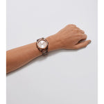 NIXON WATCHES Mod. A327-3346 worn on lady's wrist, 37mm acetate case, quartz movement, water-resistant 10 ATM, in official packaging.