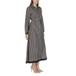 Woman wearing Only Black Recycled Polyester Long dress, part of the fall/winter collection with 68% recycled polyester.