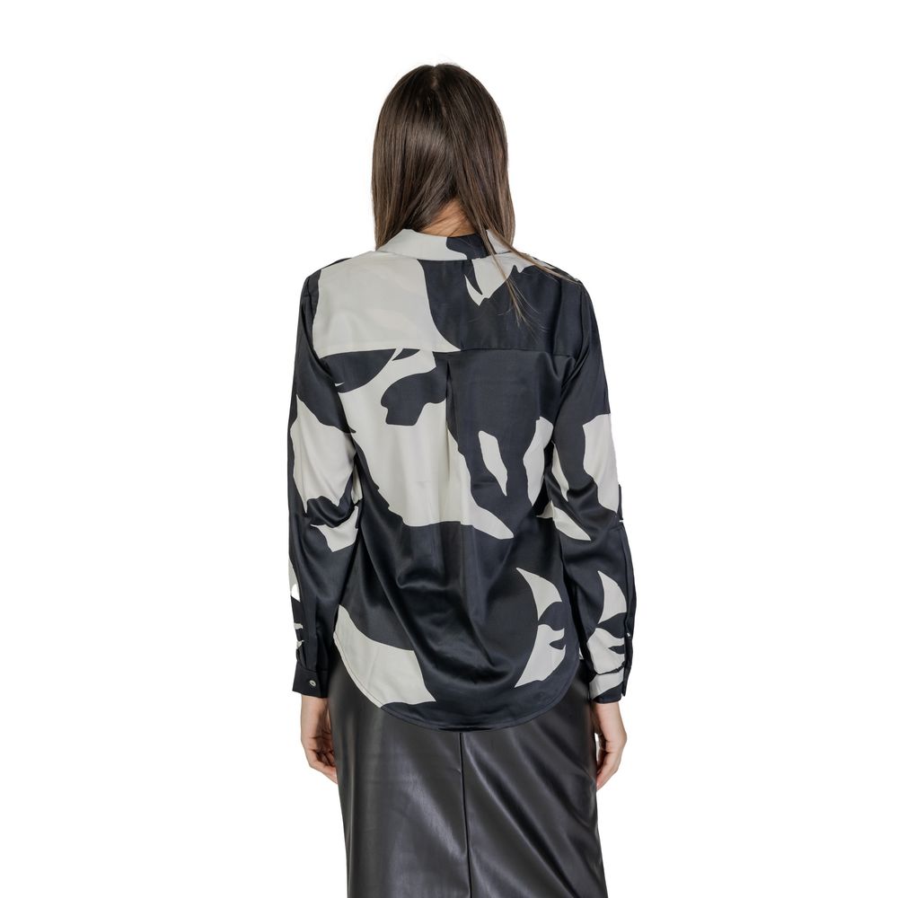 Women wearing Only Black Recycled Polyester Shirt from Fall/Winter collection, 68% recycled polyester.