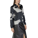 Model wearing Only Black Recycled Polyester Shirt from Fall/Winter collection, women's shirts and blouses, eco-friendly fashion.