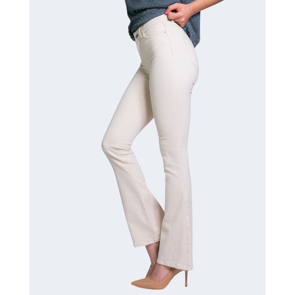 Woman wearing Only Cream Cotton Bootcut Jean with flared design, perfect for casual and chic styles.